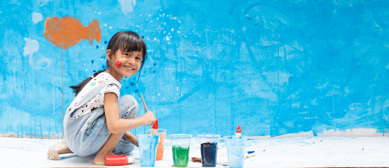 Small girl painting